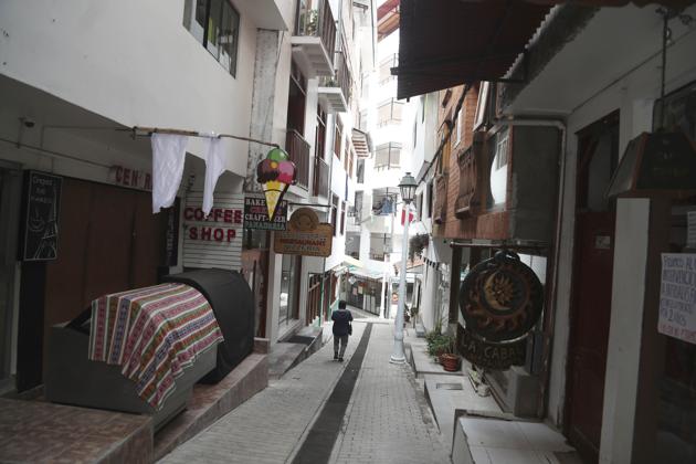 Restaurants are closed amid the COVID-19 pandemic in Aguas Calientes, at the base of Macchu Pichu, Peru, Tuesday, Oct. 27, 2020. The world-renown Incan citadel of Machu Picchu will reopen to the public on Nov. 1. (AP Photo/Martin Mejia) (AP)