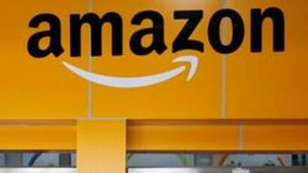 An employee of Amazon walks through a turnstile gate inside an Amazon Fulfillment Centre on the outskirts of Bengaluru.(Reuters File Photo) An employee of Amazon walks through a turnstile gate inside an Amazon Fulfillment Centre on the outskirts of Bengaluru.(Reuters File Photo)