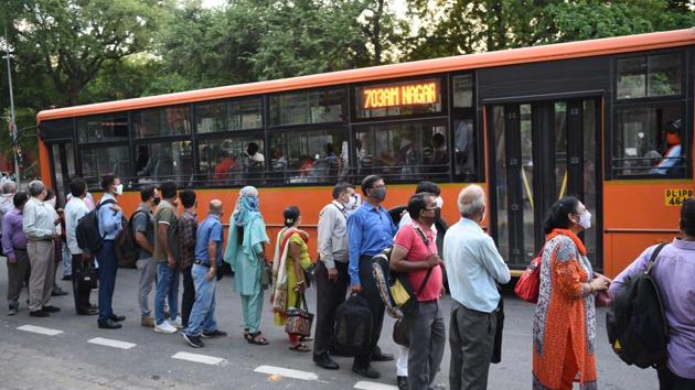 Commuters queue to board DTC buses at Pandit Pant Marg near Central Secretariat in New Delhi.(Arvind Yadav/HT PHOTO) Commuters queue to board DTC buses at Pandit Pant Marg near Central Secretariat in New Delhi.(Arvind Yadav/HT PHOTO)