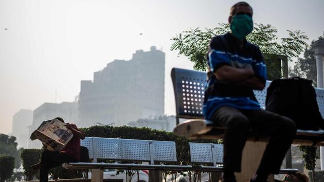 A day after Delhi reported the coldest October in 26 years recording a minimum temperature of 12.5 degrees Celsius, the India Meteorological Department (IMD) has predicted a misty day on Friday with minimum temperature likely to drop to 12 degrees Celsius. According to the Central Pollution Control Board (CPCB), the AQI value was 380 at 7 am on the morning of October 30. (Jewel Samad / AFP)