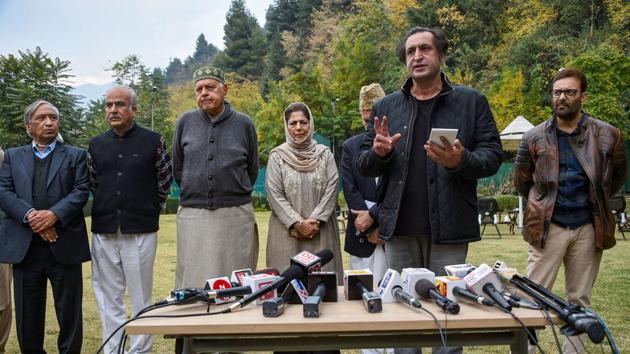 MP and President of National Conference (NC) Farooq Abdullah and PDP chief and former Chief Minister Mehbooba Mufti and other leaders look on as People's Alliance for Gupkar Declaration spokesperson Sajjad Lone speaks to the media after a meeting of the Alliance, in Srinagar, Saturday.(PTI)