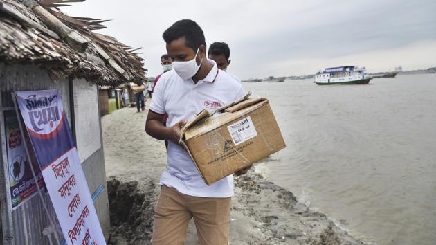 In this photo provided by Bidyanondo Foundation, a health worker arrives in a village with supplies at Banishanta near Mongla seaport in southwestern region of Bangladesh, on Sept. 1, 2020. (AP)