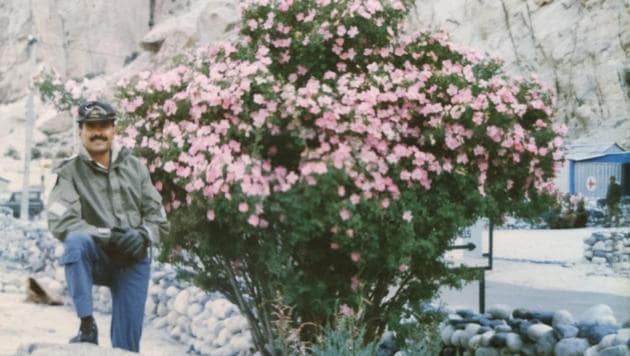 Ace helicopter pilot, Manmohan Bahadur, stands along a rose bush at Siachen base camp, 1995 summer.(Sourced)