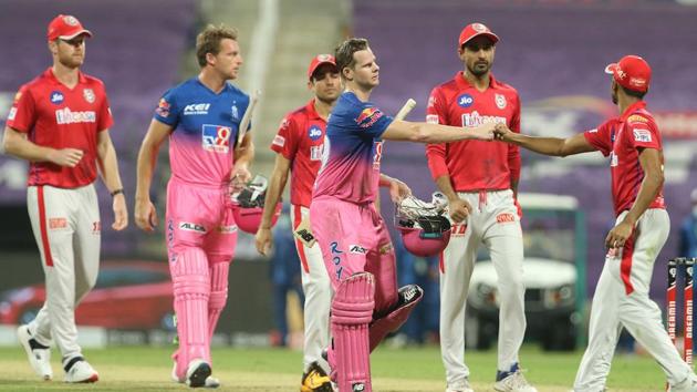 Rajasthan Royals captain Steve Smith shakes hands with players of Kings XI Punjab after his team’s seven-wicket win in Abu Dhabi (IPL/Twitter)