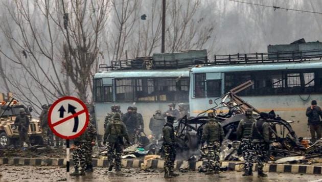 Security personnel at the site of suicide bomb attack at Lathepora Awantipora in Pulwama district of south Kashmir on February 14, 2019.(PTI file) Security personnel at the site of suicide bomb attack at Lathepora Awantipora in Pulwama district of south Kashmir on February 14, 2019.(PTI file)