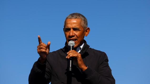 Former US president Barack Obama gestures as he speaks at a democratic US presidential nominee and former Vice President Joe Biden's campaign drive-in, mobilization event in Flint, Michigan, US on October 31, 2020. (Reuters Photo) Former US president Barack Obama gestures as he speaks at a democratic US presidential nominee and former Vice President Joe Biden's campaign drive-in, mobilization event in Flint, Michigan, US on October 31, 2020. (Reuters Photo)