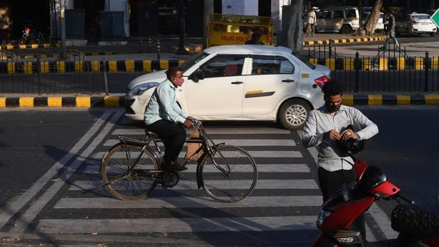 Commuters wearing face masks seen near Connaught Place in New Delhi on October 31. While the average wind speed on October 31 had touched 18 kmph, it did not clean up the air as expected, the IMD said. (Sajjad Hussain / AFP) Commuters wearing face masks seen near Connaught Place in New Delhi on October 31. While the average wind speed on October 31 had touched 18 kmph, it did not clean up the air as expected, the IMD said. (Sajjad Hussain / AFP)