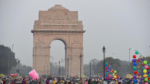 People throng Rajpath lawns, India Gate area in Delhi amid Covid-19 pandemic on Sunday, November 1. (PTI) People throng Rajpath lawns, India Gate area in Delhi amid Covid-19 pandemic on Sunday, November 1. (PTI)