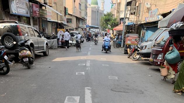 Photos of French president Emanuel Macron were found stuck on the road near Shivdarshan on Sunday. (RAVINDRA JOSHI/HT) Photos of French president Emanuel Macron were found stuck on the road near Shivdarshan on Sunday. (RAVINDRA JOSHI/HT)