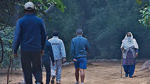 Morning walkers at a Delhi park on Sunday. (PTI photo) Morning walkers at a Delhi park on Sunday. (PTI photo)