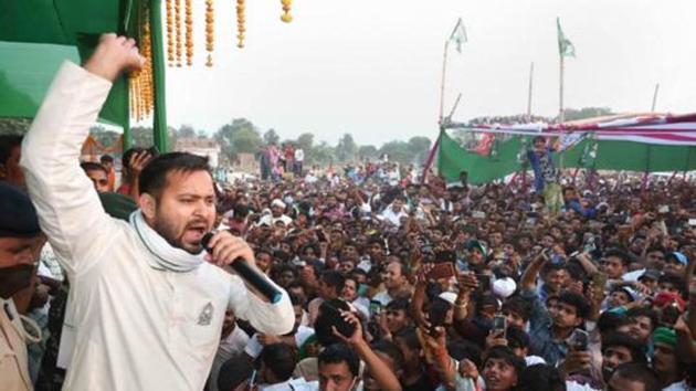 RJD leader Tejashwi Yadav addresses an election rally at Raghopur, in Hajipur on Thursday. (PTI File Photo) RJD leader Tejashwi Yadav addresses an election rally at Raghopur, in Hajipur on Thursday. (PTI File Photo)