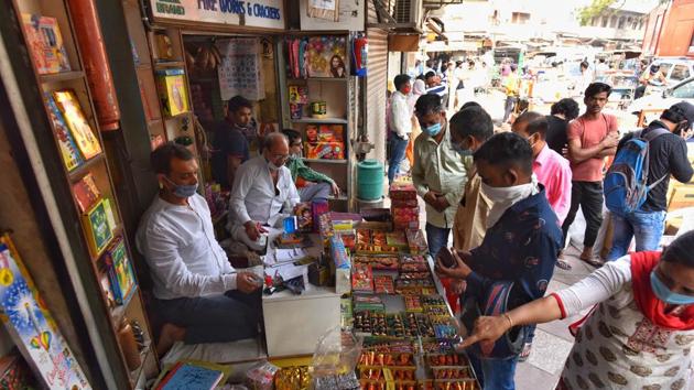 People shop for Green crackers ahead of Diwali in New Delhi on October 30, 2020. (Sanchit Khanna/HT file photo) People shop for Green crackers ahead of Diwali in New Delhi on October 30, 2020. (Sanchit Khanna/HT file photo)