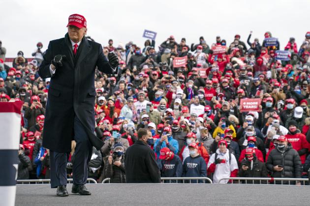 President Donald Trump after speaking during a campaign rally. (AP) President Donald Trump after speaking during a campaign rally. (AP)
