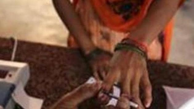 Voting will be held from 7 AM to 6 PM, except in Chhattisgarh, Jharkhand and Nagaland where the timings are different, and the number of people allowed in a polling booth has been restricted. (AP file photo) Voting will be held from 7 AM to 6 PM, except in Chhattisgarh, Jharkhand and Nagaland where the timings are different, and the number of people allowed in a polling booth has been restricted. (AP file photo)