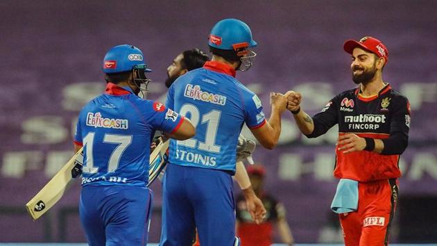 Skipper Virat Kohli of Royal Challengers Bangalore greets Marcus Stoinis and Rishabh Pant of Delhi Capitals after their Indian Premier League (IPL) cricket match at the Sheikh Zayed Stadium, in Abu Dhabi. (PTI) Skipper Virat Kohli of Royal Challengers Bangalore greets Marcus Stoinis and Rishabh Pant of Delhi Capitals after their Indian Premier League (IPL) cricket match at the Sheikh Zayed Stadium, in Abu Dhabi. (PTI)