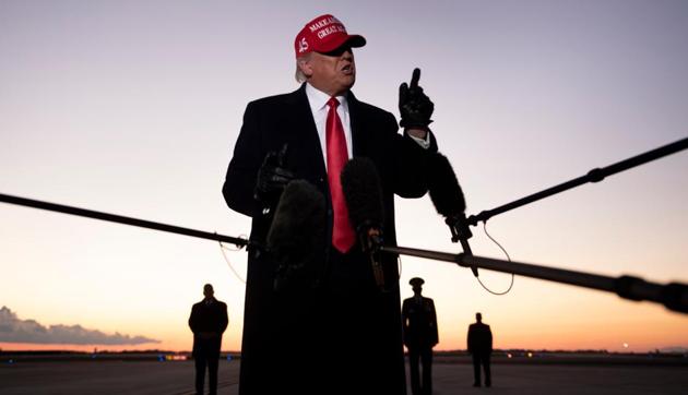 US President Donald Trump speaks to the press at Charlotte Douglas International Airport on November 1, 2020, in Charlotte, North Carolina. (AFP) US President Donald Trump speaks to the press at Charlotte Douglas International Airport on November 1, 2020, in Charlotte, North Carolina. (AFP)
