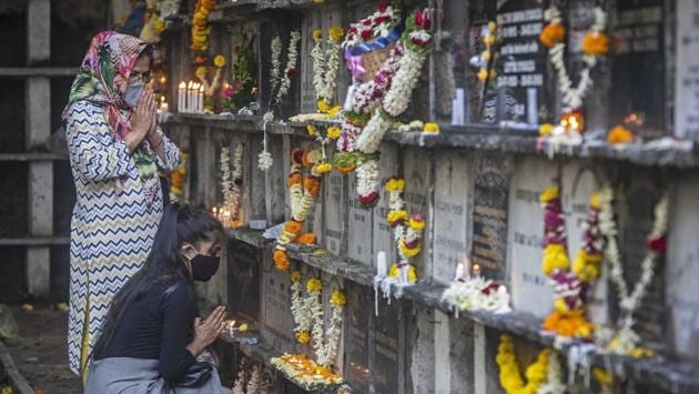 People visit City Church Cemetery as they observe All Souls’ Day to commemorate and to pray for the departed loved ones in Pune on November 2. So far, 123,097 people have succumbed to the virus with 496 deaths in the past 24 hours. (Pratham Gokhale / HT Photo) People visit City Church Cemetery as they observe All Souls’ Day to commemorate and to pray for the departed loved ones in Pune on November 2. So far, 123,097 people have succumbed to the virus with 496 deaths in the past 24 hours. (Pratham Gokhale / HT Photo)