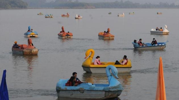 People enjoy boat rides at Sukhna Lake in Chandigarh on November 1. According to the Union Health Ministry, such spikes in cases are a result of the increased activity due to the festive season as well as violations of basic codes of Covid-19 appropriate behaviour in public. (Keshav Singh / HT Photo) People enjoy boat rides at Sukhna Lake in Chandigarh on November 1. According to the Union Health Ministry, such spikes in cases are a result of the increased activity due to the festive season as well as violations of basic codes of Covid-19 appropriate behaviour in public. (Keshav Singh / HT Photo)