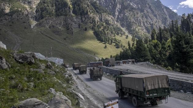 An Indian army convoy moves on the Srinagar- Ladakh highway.(AP Photo) An Indian army convoy moves on the Srinagar- Ladakh highway.(AP Photo)