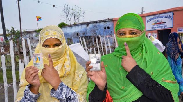 Women show their fingers marked with indelible ink after casting their votes for the second phase of Bihar Assembly Elections on Tuesday. (PTI) Women show their fingers marked with indelible ink after casting their votes for the second phase of Bihar Assembly Elections on Tuesday. (PTI)