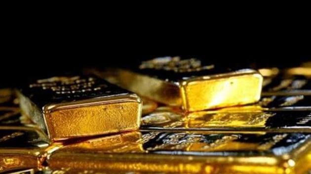 Spot gold were down 0.1% at $1,892.52 per ounce by 0353 GMT. (Reuters image) Spot gold were down 0.1% at $1,892.52 per ounce by 0353 GMT. (Reuters image)