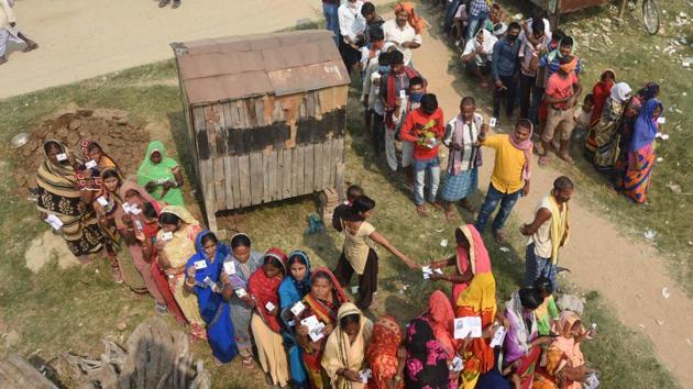 Voters at a polling station show their voter ID cards during the second phase of Bihar Assembly Elections, at Danapur Diyara Patlapur gaon, in Patna, Bihar, India, on Tuesday, Nov. 03, 2020. (Photo by Santosh Kumar/ Hindustan Times) Voters at a polling station show their voter ID cards during the second phase of Bihar Assembly Elections, at Danapur Diyara Patlapur gaon, in Patna, Bihar, India, on Tuesday, Nov. 03, 2020. (Photo by Santosh Kumar/ Hindustan Times)