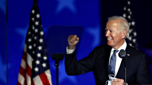 Joe Biden, 2020 Democratic presidential nominee, gestures while arriving during an election night party in Wilmington, Delaware, U.S., on Wednesday. (Bloomberg) Joe Biden, 2020 Democratic presidential nominee, gestures while arriving during an election night party in Wilmington, Delaware, U.S., on Wednesday. (Bloomberg)