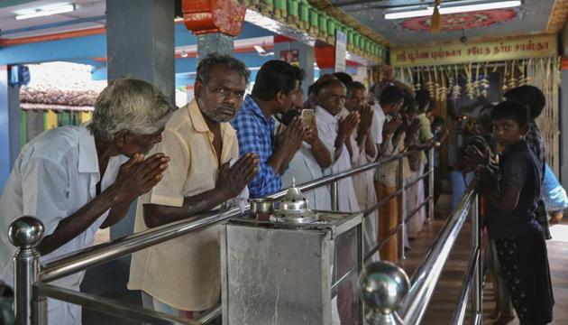 Devotees participate in a special prayer for the success of U.S. Democratic vice presidential candidate Sen. Kamala Harris, at a temple in Thulasendrapuram village, south of Chennai.(AP) Devotees participate in a special prayer for the success of U.S. Democratic vice presidential candidate Sen. Kamala Harris, at a temple in Thulasendrapuram village, south of Chennai.(AP)