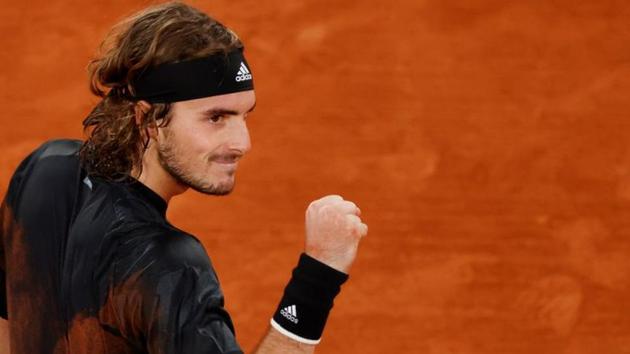 Tennis - French Open - Roland Garros, Paris, France - October 5, 2020 Greece's Stefanos Tsitsipas celebrates winning his fourth round match against Bulgaria's Grigor Dimitrov REUTERS/Christian Hartmann (REUTERS) Tennis - French Open - Roland Garros, Paris, France - October 5, 2020 Greece's Stefanos Tsitsipas celebrates winning his fourth round match against Bulgaria's Grigor Dimitrov REUTERS/Christian Hartmann (REUTERS)