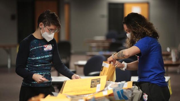 Election officials count absentee ballots on November 04, 2020 in Milwaukee, Wisconsin. (AFP) Election officials count absentee ballots on November 04, 2020 in Milwaukee, Wisconsin. (AFP)