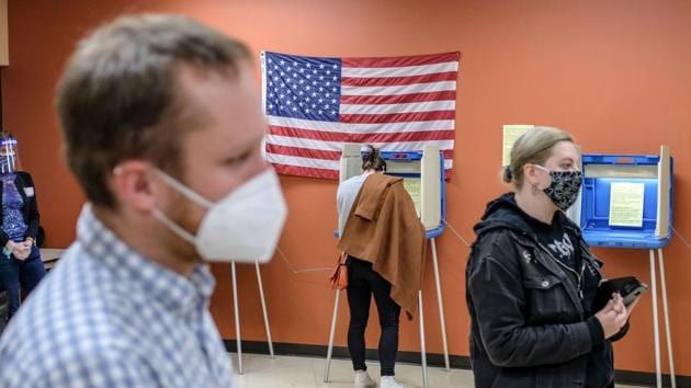 Voters cast ballots at a polling location in Milwaukee, Wisconsin.(Bloomberg) Voters cast ballots at a polling location in Milwaukee, Wisconsin.(Bloomberg)