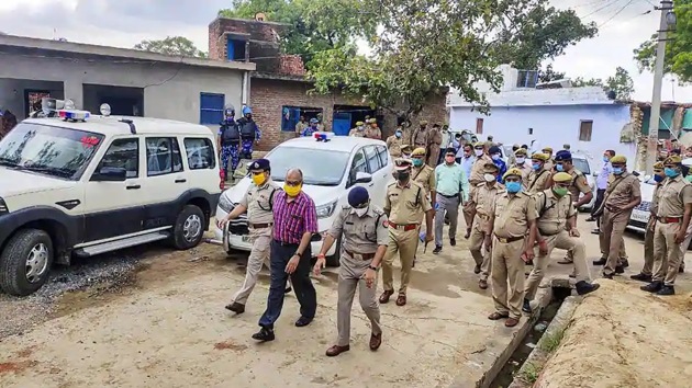 The Special Investigation Team at Bikru village in Kanpur where eight Uttar Pradesh policemen were killed in an ambush on July 3.(PTI FILE PHOTO)