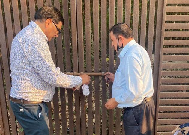 MC officials sealing an industrial unit for not paying property tax at Industrial Area, Phase 2, in Mohali on Thursday. (HT Photo) MC officials sealing an industrial unit for not paying property tax at Industrial Area, Phase 2, in Mohali on Thursday. (HT Photo)