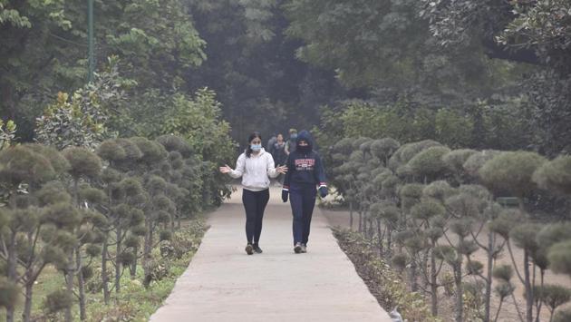 Morning walkers out on a hazy and cold morning in Lodhi Garden on November 4. A cold wave occurs when the minimum temperature is 10 degrees Celsius or less, and 4.5 degrees less than normal for two consecutive days. Delhi has recorded minimum temperatures of 11-10 degrees Celsius for the past four days. (Sanjeev Verma / HT PHOTO) Morning walkers out on a hazy and cold morning in Lodhi Garden on November 4. A cold wave occurs when the minimum temperature is 10 degrees Celsius or less, and 4.5 degrees less than normal for two consecutive days. Delhi has recorded minimum temperatures of 11-10 degrees Celsius for the past four days. (Sanjeev Verma / HT PHOTO)