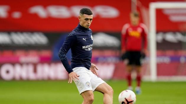 FILE PHOTO: Soccer Football - Premier League - Sheffield United v Manchester City - Bramall Lane, Sheffield, Britain - October 31, 2020 Manchester City's Phil Foden during the warm up before the match Tim Keeton/Pool via REUTERS/File Photo(REUTERS)