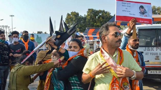 Rashtriya Bajrang Dal and Shiv Sena activists stage a protest against PDP president and former chief minister Mehbooba Mufti over her recent remarks, in Jammu on November 5. (PTI) Rashtriya Bajrang Dal and Shiv Sena activists stage a protest against PDP president and former chief minister Mehbooba Mufti over her recent remarks, in Jammu on November 5. (PTI)