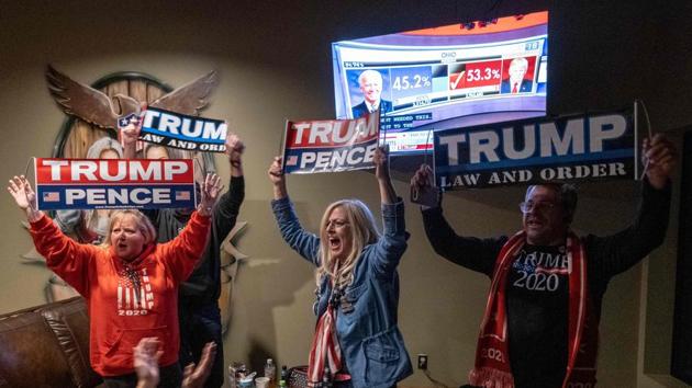 Trump voters interviewed by the Associated Press reporters said they value individual freedom and believed the president was doing as well as anyone could in response to the coronavirus(AFP)