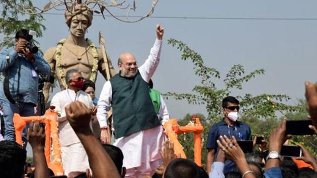 Union home minister Amit Shah gestures after paying tribute to freedom fighter Birsa Munda in Bankura district. (PTI Photo) Union home minister Amit Shah gestures after paying tribute to freedom fighter Birsa Munda in Bankura district. (PTI Photo)