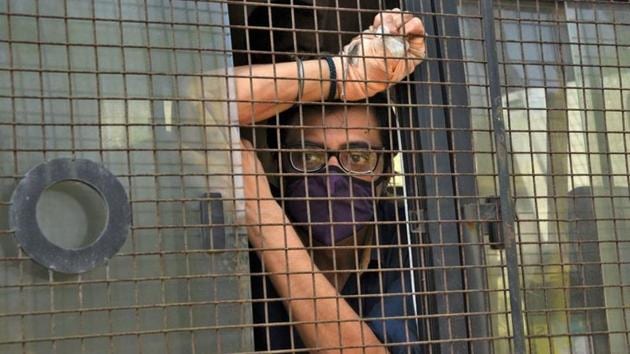 Arnab Goswami, Republic TV editor-in- chief, sits inside a police van outside a court after he was arrested, at Alibaug town in Maharashtra, November 4, 2020.(Reuters photo) Arnab Goswami, Republic TV editor-in- chief, sits inside a police van outside a court after he was arrested, at Alibaug town in Maharashtra, November 4, 2020.(Reuters photo)