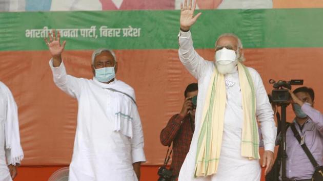 Prime Minister Narendra Modi with JDU national president and Bihar Chief Minister Nitish Kumar during an election rally in Bhagalpur, Bihar.(Santosh Kumar/ Hindustan Times)