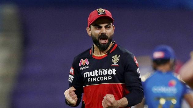 Virat Kohli of the Royal Challengers Bangalore celebrates the wicket of Ishan Kishan of Mumbai Indians during Indian Premier League (IPL) match between the Mumbai Indians and the Royal Challengers Bangalore. (PTI) Virat Kohli of the Royal Challengers Bangalore celebrates the wicket of Ishan Kishan of Mumbai Indians during Indian Premier League (IPL) match between the Mumbai Indians and the Royal Challengers Bangalore. (PTI)