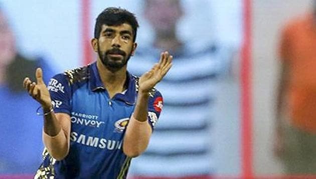 Mumbai Indians (MI) player Jasprit Bumrah celebrates the wicket of Kolkata Knight Riders batsman Andre Russell during Indian Premier League (IPL) cricket match, at Sheikh Zayed Stadium in Abu Dhabi.(PTI)