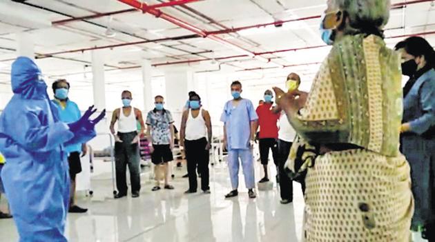 Patients admitted at Jumbo Covid Centre practise yoga in Pune earlier in October.(File photo) Patients admitted at Jumbo Covid Centre practise yoga in Pune earlier in October.(File photo)