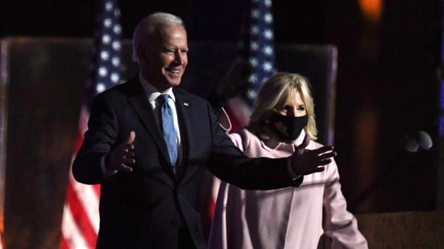 Democratic presidential nominee Joe Biden and wife Jill Biden arrive onstage to address supporters during election night at the Chase Center in Wilmington, Delaware.(AFP) Democratic presidential nominee Joe Biden and wife Jill Biden arrive onstage to address supporters during election night at the Chase Center in Wilmington, Delaware.(AFP)