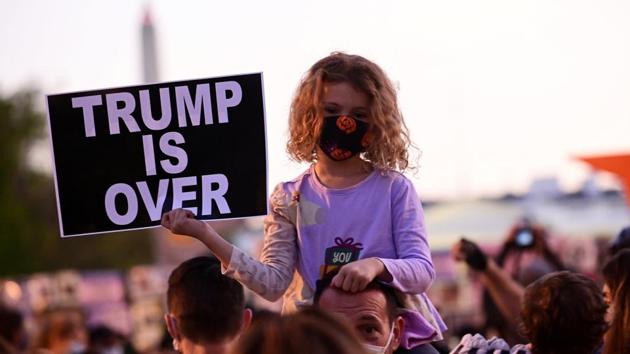 A child holds a Trump protest sign outside the White House following the US presidential election in Washington, US, November 6, 2020. (Reuters Photo) A child holds a Trump protest sign outside the White House following the US presidential election in Washington, US, November 6, 2020. (Reuters Photo)