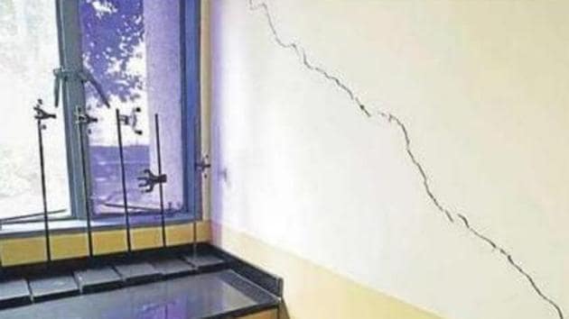 The walls of The Sri Ram School in Phase-3 had developed cracks due to deep digging carried out by Ambience Group for a commercial complex. (Praveen Kumar/HT Photo) The walls of The Sri Ram School in Phase-3 had developed cracks due to deep digging carried out by Ambience Group for a commercial complex. (Praveen Kumar/HT Photo)