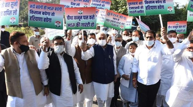 Congress leader Bhupinder Singh Hooda with party legislators during a protest march in support of farmers in Chandigarh on Friday. (Keshav Singh/HT) Congress leader Bhupinder Singh Hooda with party legislators during a protest march in support of farmers in Chandigarh on Friday. (Keshav Singh/HT)