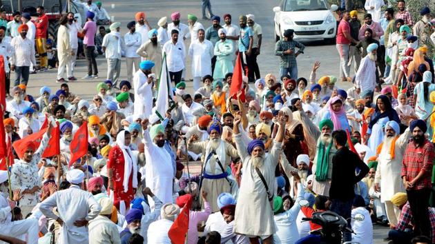 Members of various farmers' unions demonstrate blocking NH 44 Delhi-Amritsar Highway on the Punjab-Haryana border in protest against the new farm reform laws in Shambhu, Patiala District, Punjab on Thursday. (Bharat Bhushan) Members of various farmers' unions demonstrate blocking NH 44 Delhi-Amritsar Highway on the Punjab-Haryana border in protest against the new farm reform laws in Shambhu, Patiala District, Punjab on Thursday. (Bharat Bhushan)