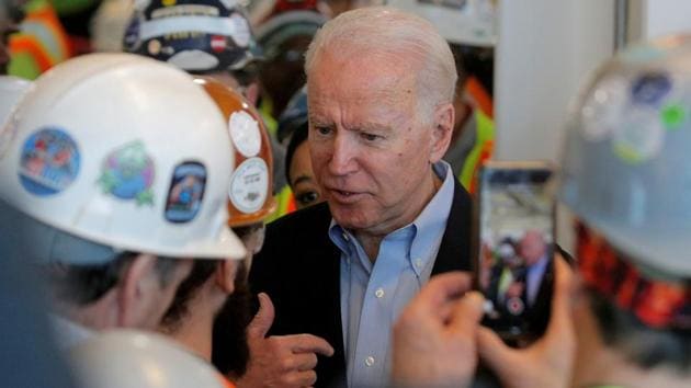 US President elect and former Vice President Joe Biden argues with a worker about his gun control policies during a Biden campaign stop at the FCA (Fiat Chrysler Automobiles) Mack Assembly plant in Detroit, Michigan, US, March 10, 2020 (REUTERS/Brendan McDermid/File Photo) US President elect and former Vice President Joe Biden argues with a worker about his gun control policies during a Biden campaign stop at the FCA (Fiat Chrysler Automobiles) Mack Assembly plant in Detroit, Michigan, US, March 10, 2020 (REUTERS/Brendan McDermid/File Photo)