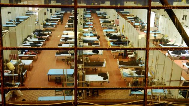 Patients recuperate at the a Covid-19 Care Centre in New Delhi on November 7. Health minister Satyendar Jain attributed the increase in the capital’s number of cases to aggressive testing and contact-tracing. The government has increased the number of beds for Covid-19 patients in hospitals in Delhi, but there is no plan to rope in hotels and banquet halls, Jain said. (PTI)